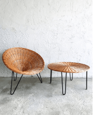 Wicker coffee table with black lacquered metal frame