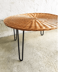 Wicker coffee table with black lacquered metal frame