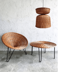 Wicker coffee table with black lacquered metal frame